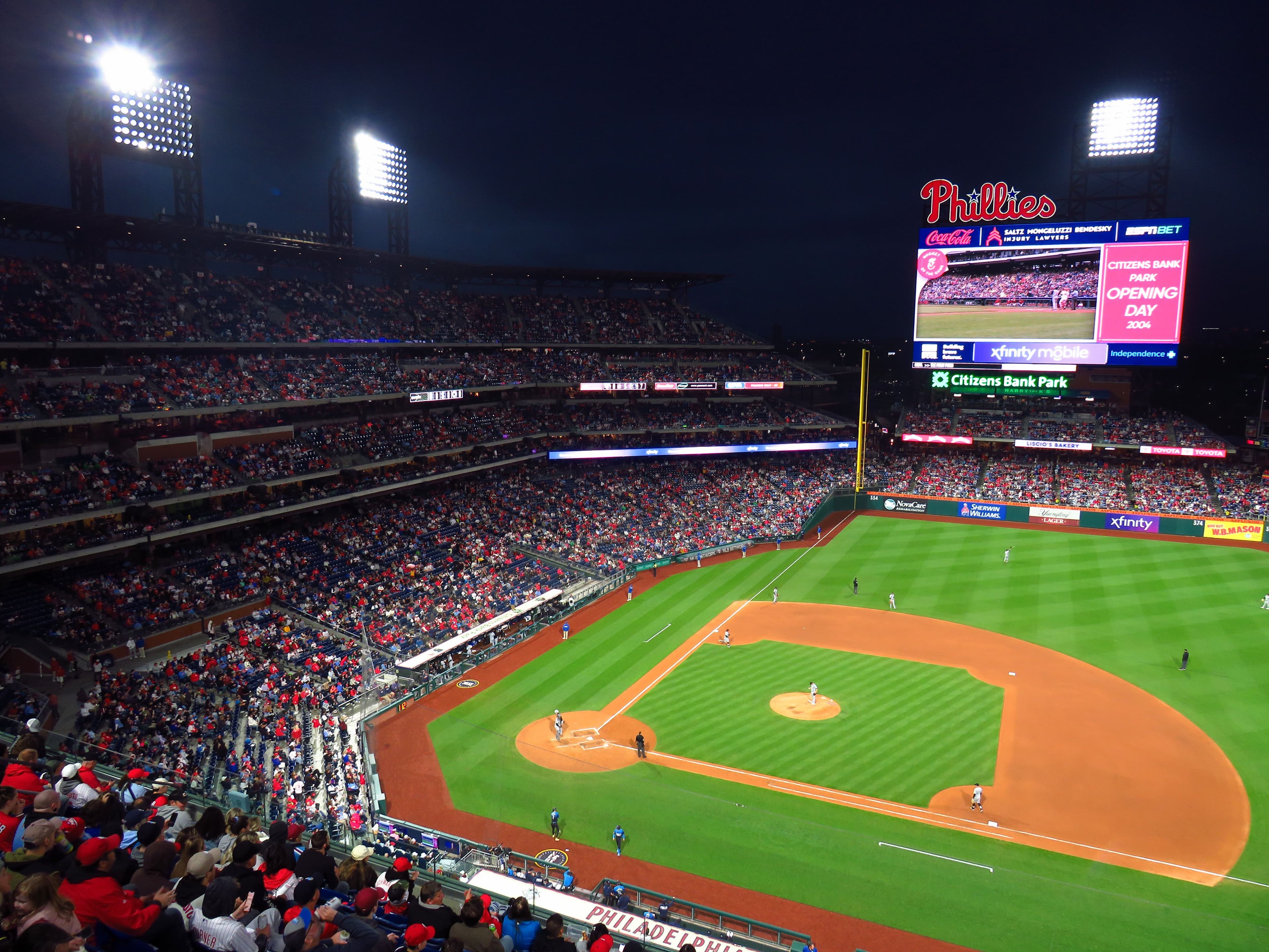 Wide daytime view of Citizens Bank Park in Philadelphia from the stands during a Phillies game.
